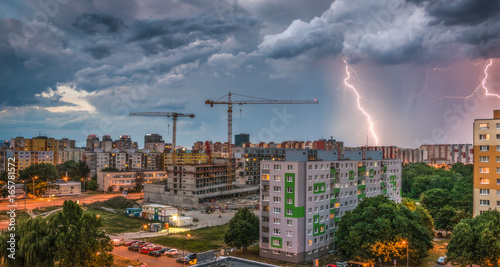 Photography Lightnings Over Housing Estate. Storm in the City.