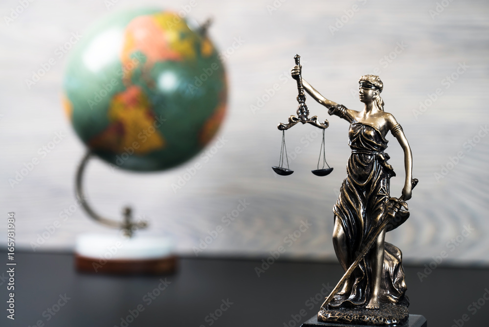Symbols for balance and power in law and court, selected focus, narrow depth of field