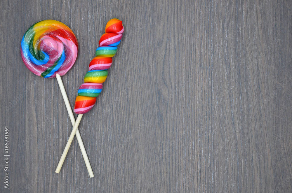 Candy lolly dark background close up photo Candy lolly dark background close up photo