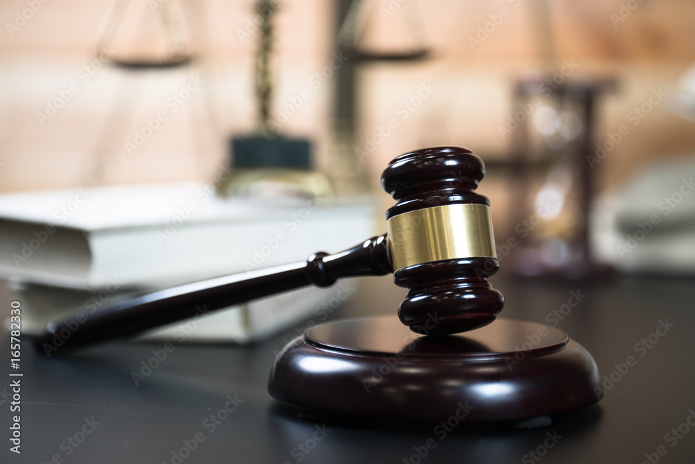 Symbols for balance and power in law and court, selected focus, narrow depth of field Symbols for balance and power in law and court, selected focus, narrow depth of field