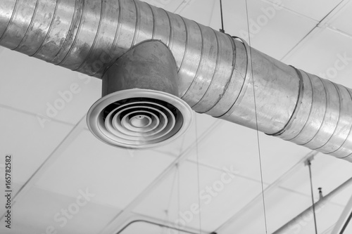 Air Duct or Air Conditioners Pipe, Danger and the cause of pneumonia in office man.