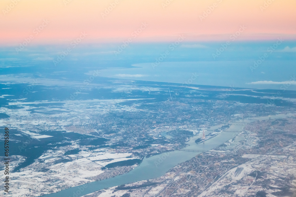 View From Airplane Window on Riga, Latvia. Sunset Sunrise Over Gulf