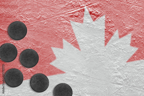 Ice, Canadian symbol and hockey pucks