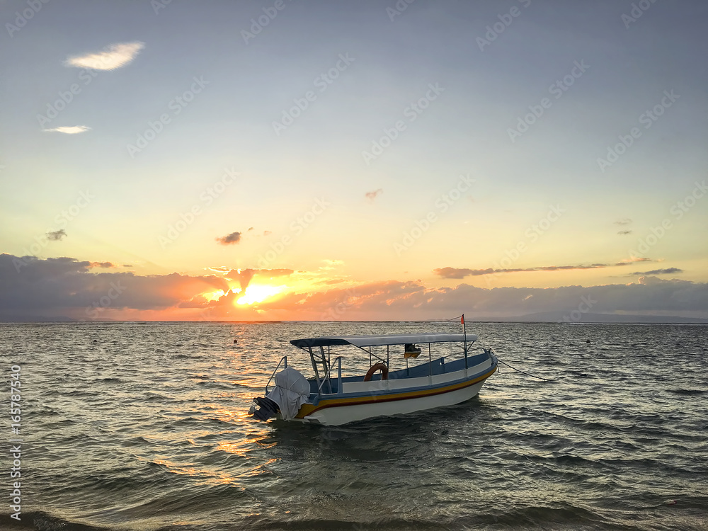 fishing boats at sunrise. Sanur Beach, Bali, Indonesia. fishing boats at sunrise. Sanur Beach, Bali, Indonesia.