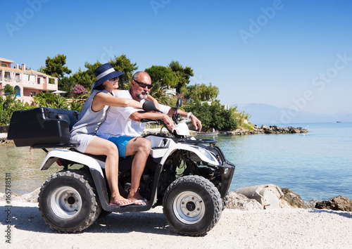 .Man and woman on the ATV. Walk to the sea on the island of Zakynthos