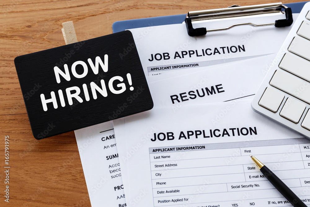 Hiring concept with now hiring sign Hiring concept with now hiring sign
