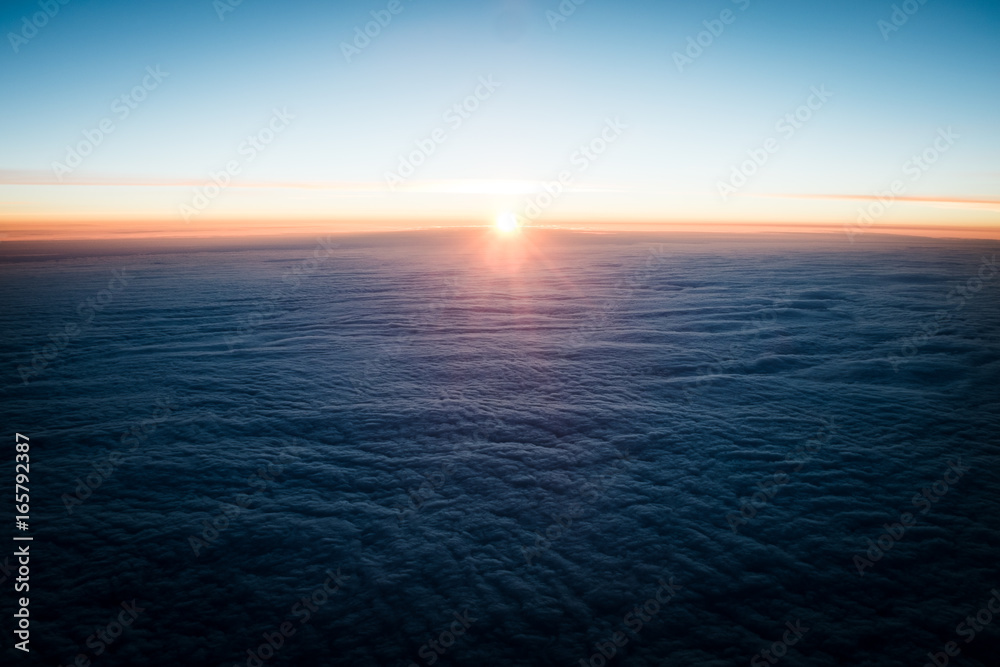 Fototapeta premium Sunrise from Airplane