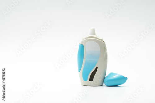 Nasal spray with opened cap, modern design on white background