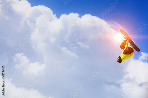 Snowboarder making jump