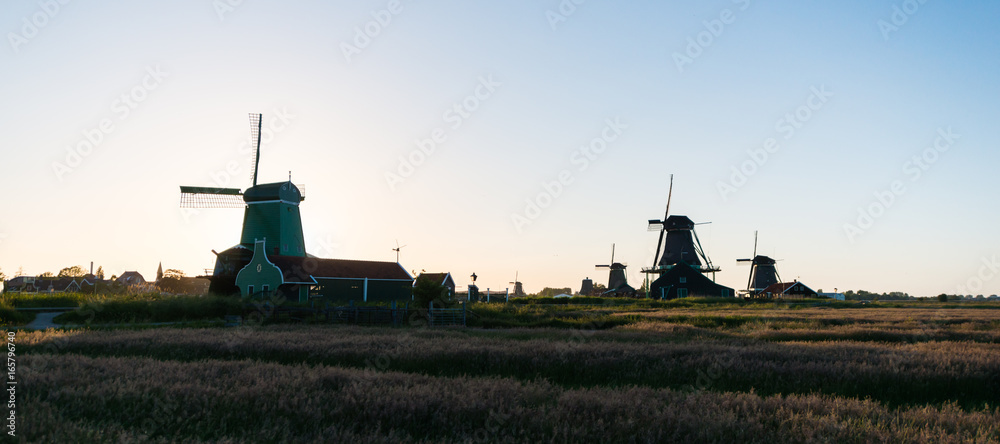 Fototapeta premium Windmills in sunset