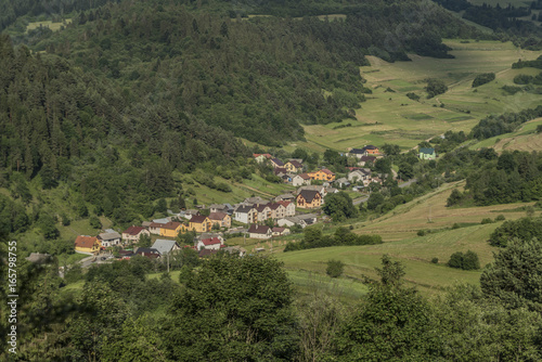 Sunny summer day over Lesnica village