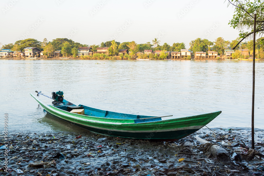 Homemade motorboat landed at a Burmese fishing village on early morning, near Yangon, Irrawaddy delta, Myanmar