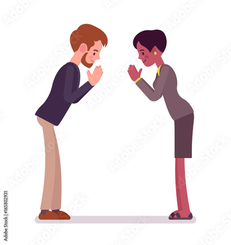 Businessman and businesswoman bow gesture