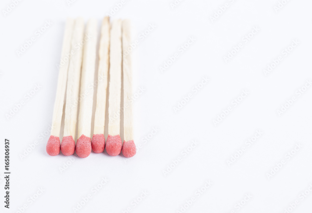 A bunch of matches isolated on white. Closeup.