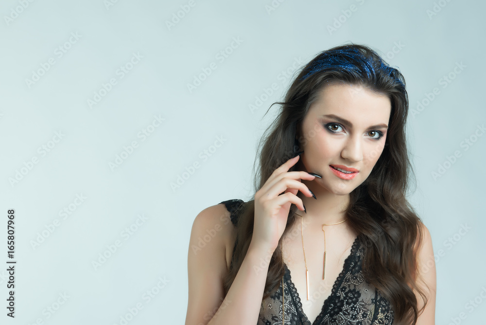 Beautiful, slim woman posing in alluring underwear.Sexy lady in elegant black bra.Fashion portrait of model indoors over isolated background. Beautiful, slim woman posing in alluring underwear.Sexy lady in elegant black bra.Fashion portrait of model indoors over isolated background.