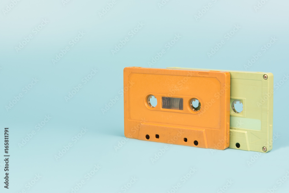 Fototapeta premium old cassette tape with light blue background