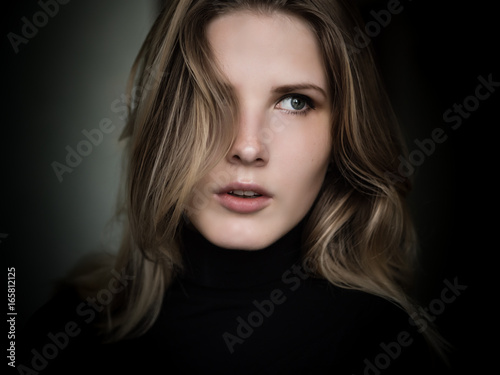 Portrait of beautiful young woman. Selective soft focus.