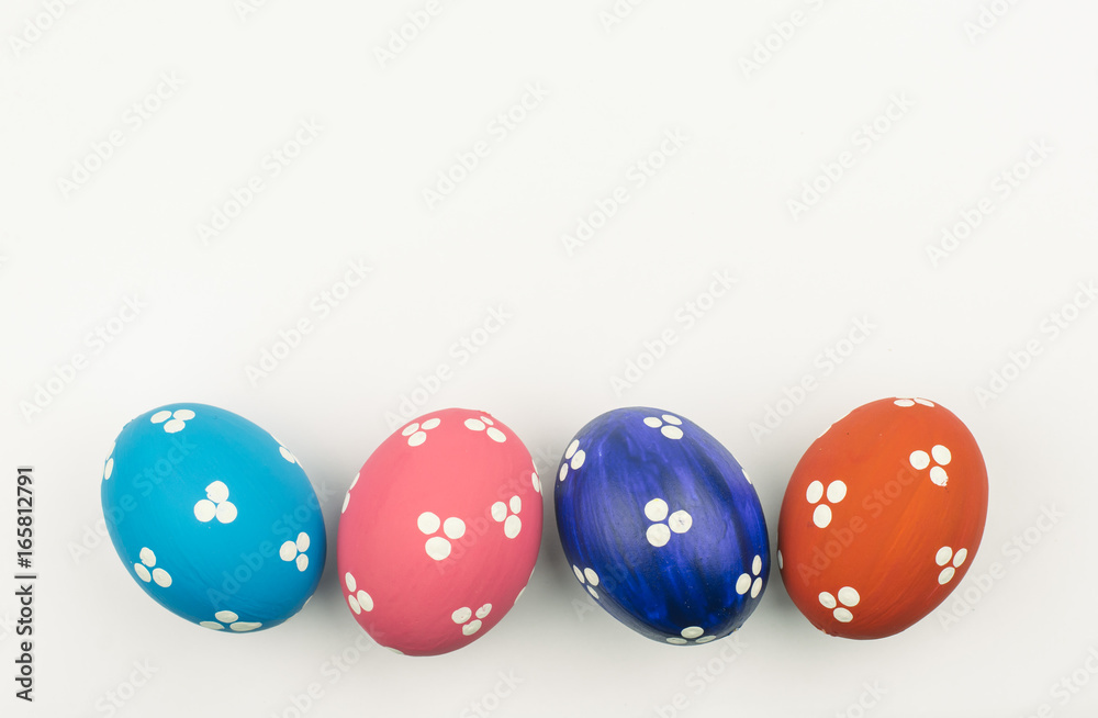 four colorful handmade easter eggs isolated on a white four colorful handmade easter eggs isolated on a white