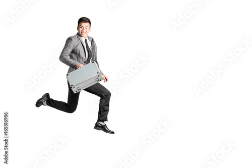 Portrait of a young business man running. Isolated on white background with copy space and clipping path