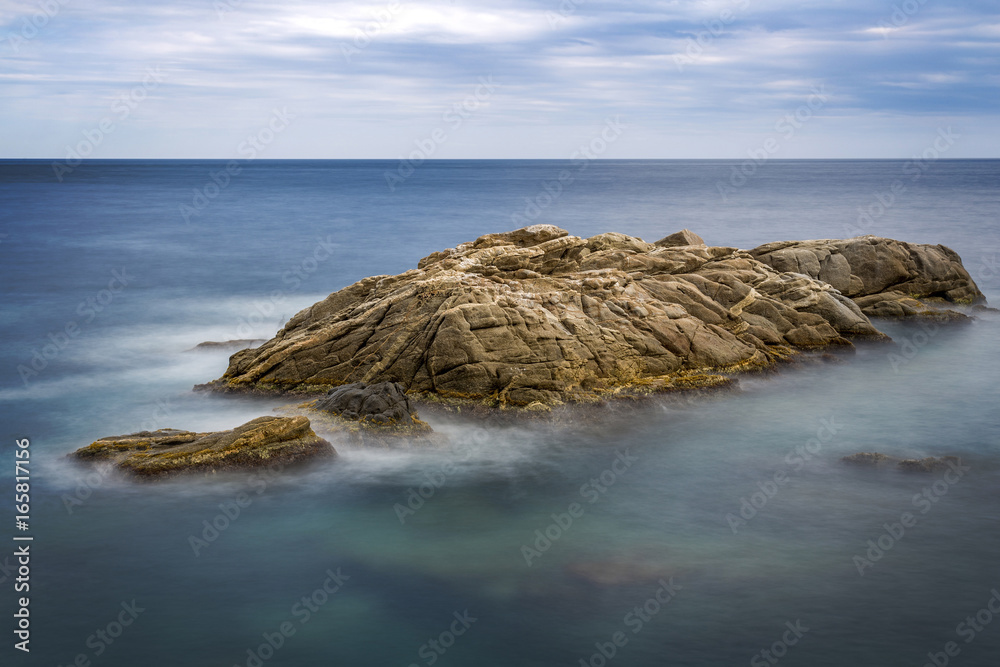 Coastal with rocks ,long exposure picture from Coasta Brava, Spain Coastal with rocks ,long exposure picture from Coasta Brava, Spain