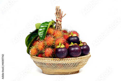 Rambutan and mangosteen in basket. © Sunisa