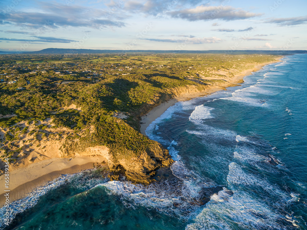 Aerial view of rugged coastline at sunset. Melbourne, Australia