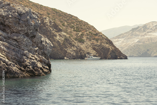sea, mountain landscape, boat moored near Psira island in Crete, Greece