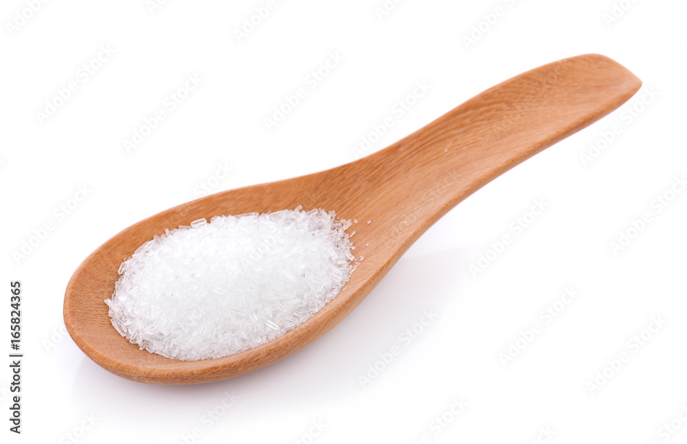 MonosodiumGlutamate (MSG or E621) on wooden spoon isolated on white background