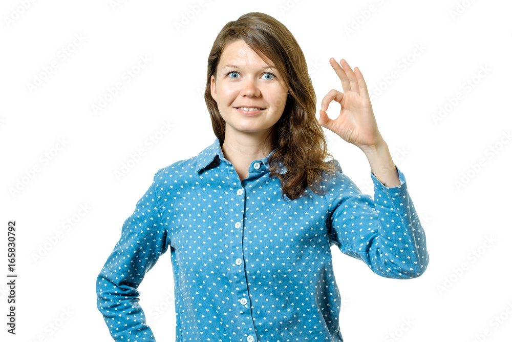 Happy young woman showing ok sign with fingers Happy young woman showing ok sign with fingers
