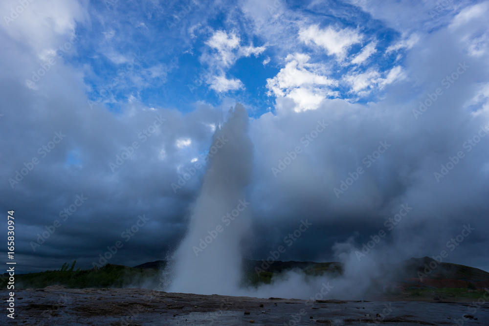 Iceland - Turquoise hot boiling water, summit of eruption of geyser strokkur
