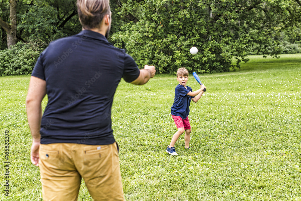Fototapeta premium Happy father and his son playing baseball