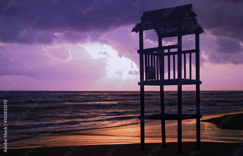 Landscape of beach with the wooden lookout tower