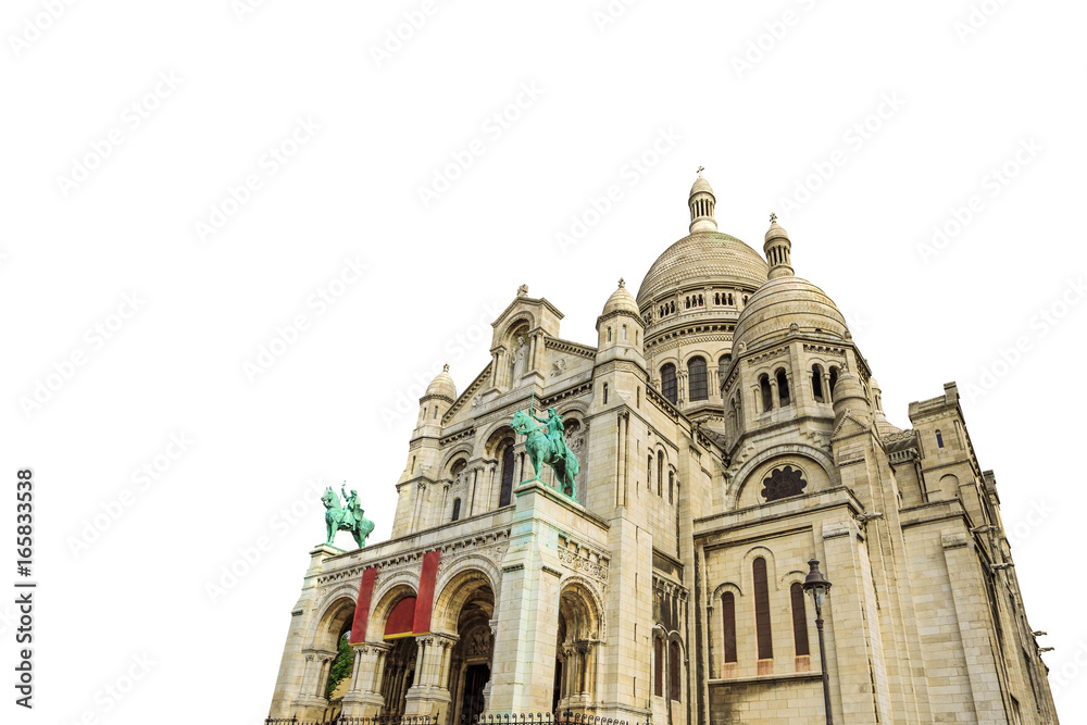 left side view of the Sacred Heart Basilica of Paris in France in Montmartre historic district of Paris city isolated on white background and copy space.