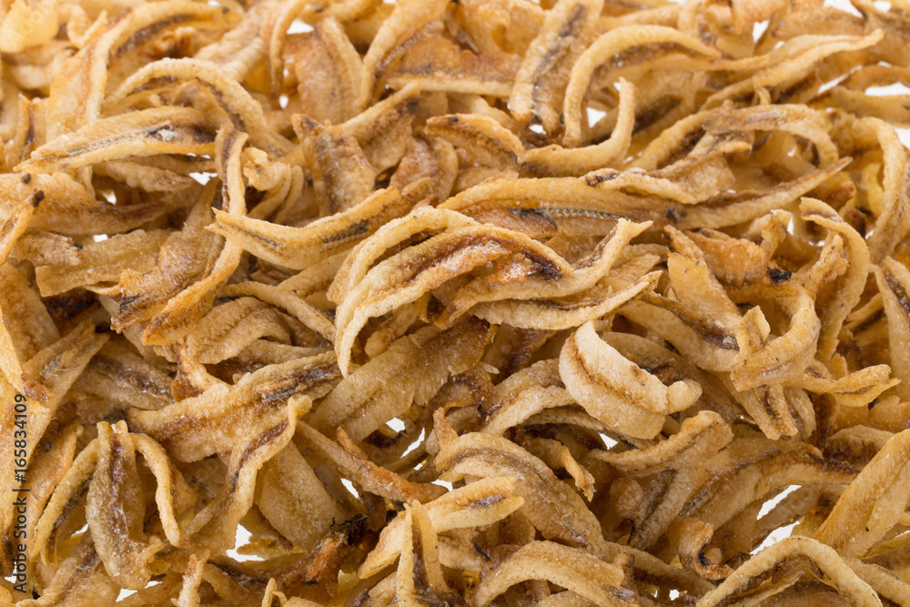 Dried Small fish anchovies and crispy Seafood isolated on white background