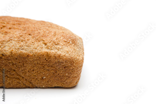 Whole Wheat Loaf of Bread on a White Background