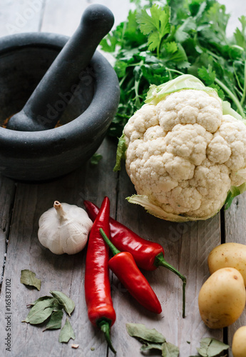 Ingredients of the indian dish Aloo Gobi photo