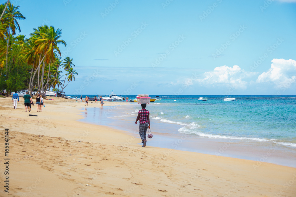 male seller on the Caribbean beach