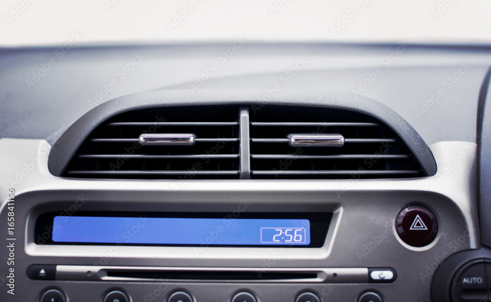 Car air conditioner in the front interior passenger for adjust airflow, selective focus, Automotive part concept. Car air conditioner in the front interior passenger for adjust airflow, selective focus, Automotive part concept.