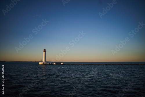 lighthouse standing on sea near port in Odessa