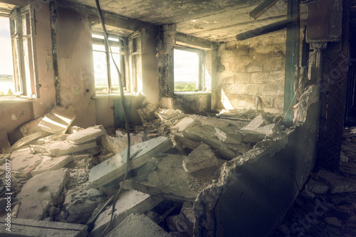Dead city.A damaged building in an abandoned city © nouskrabs