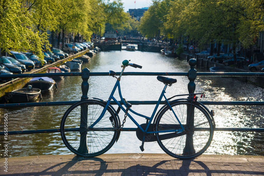 Bikes on the bridge in Amsterdam Netherlands
