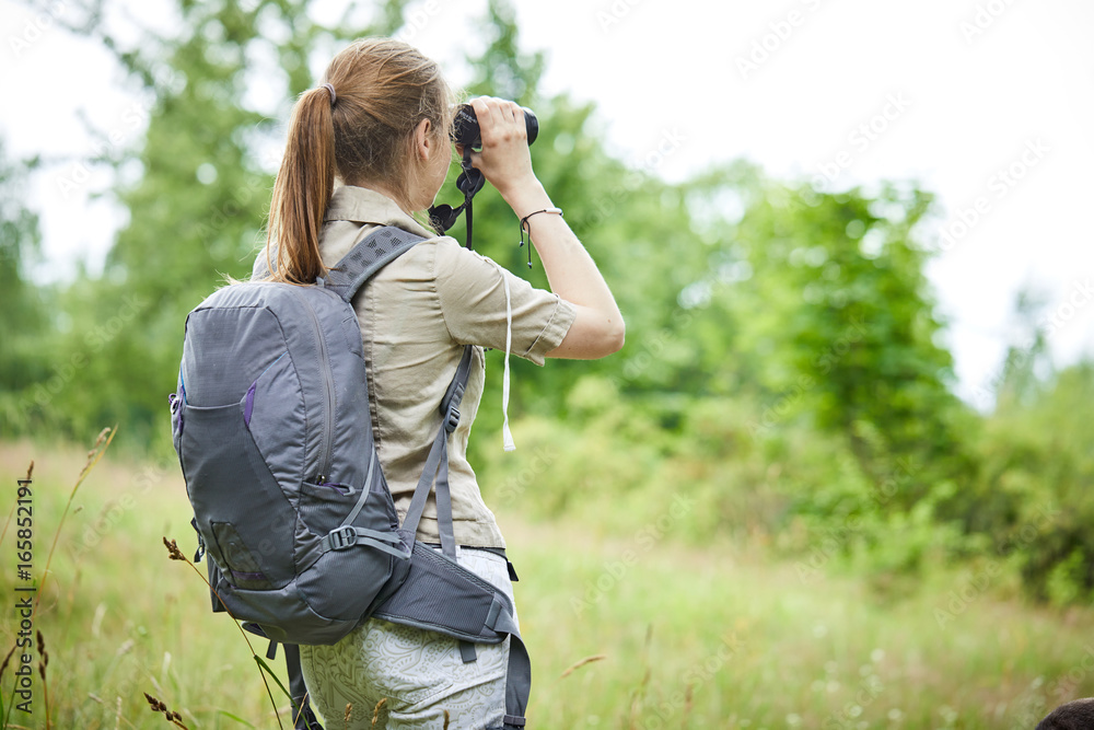 woman with binoculars woman with binoculars