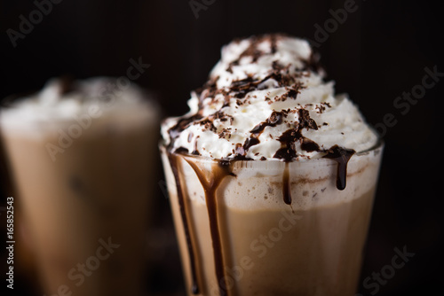Iced coffee on wooden background