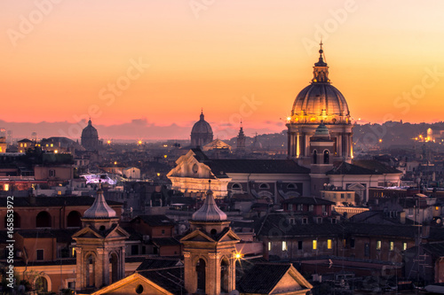 Panorama view of Rome at sunset with St Peter Cathedral © robertdering