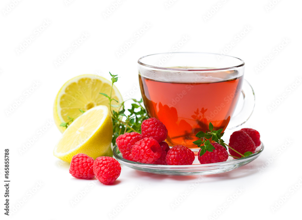 Red fruit tea with lemon and raspberry isolated on white background Red fruit tea with lemon and raspberry isolated on white background