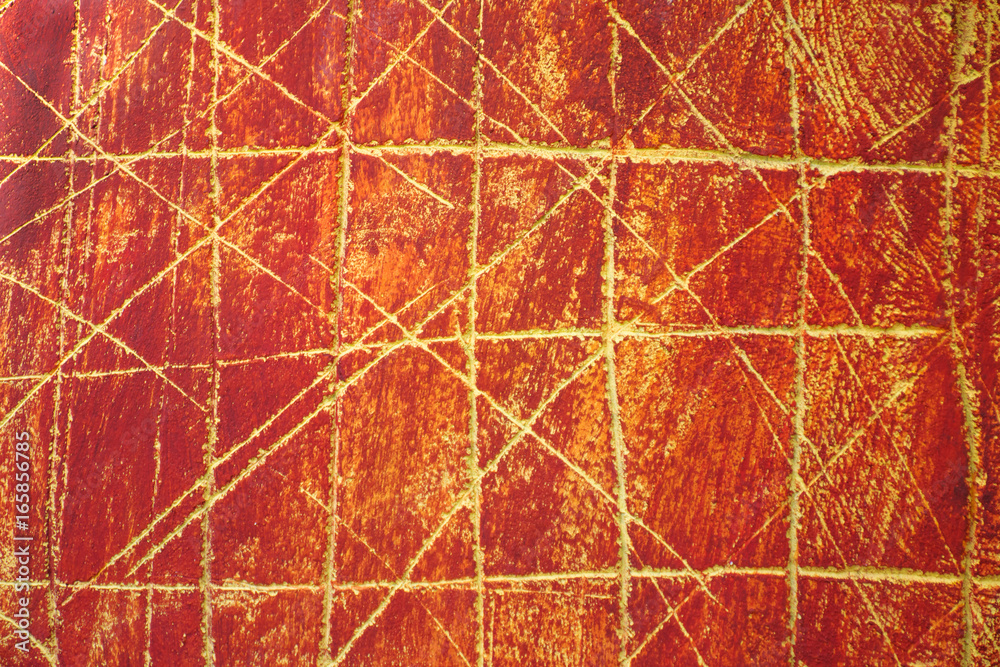 Red wall scratched pattern for decorative background.
