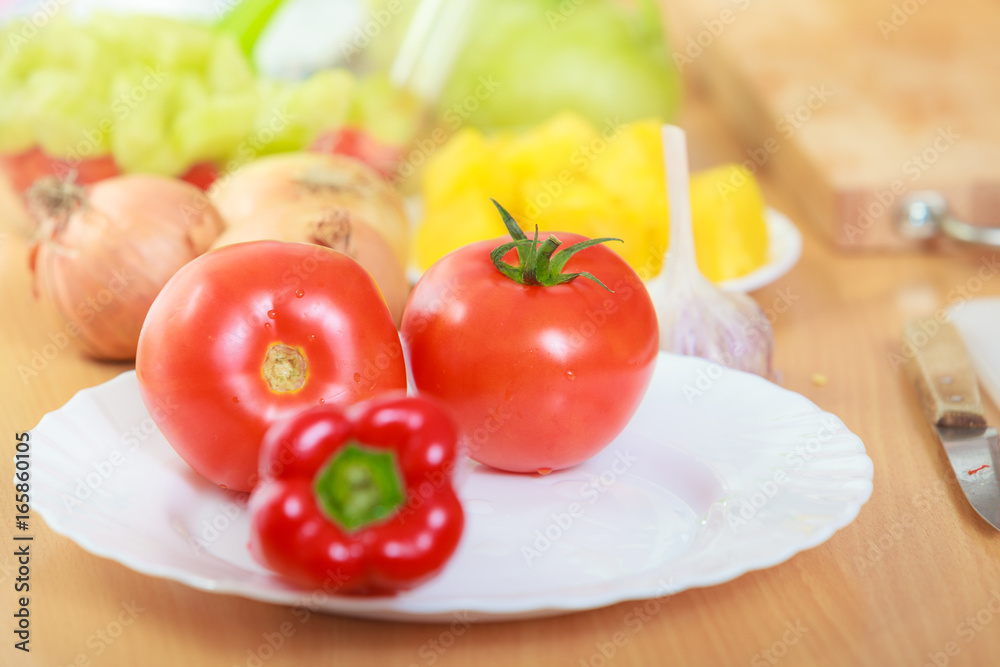 preparing vegetables salad fresh ingredients on table preparing vegetables salad fresh ingredients on table