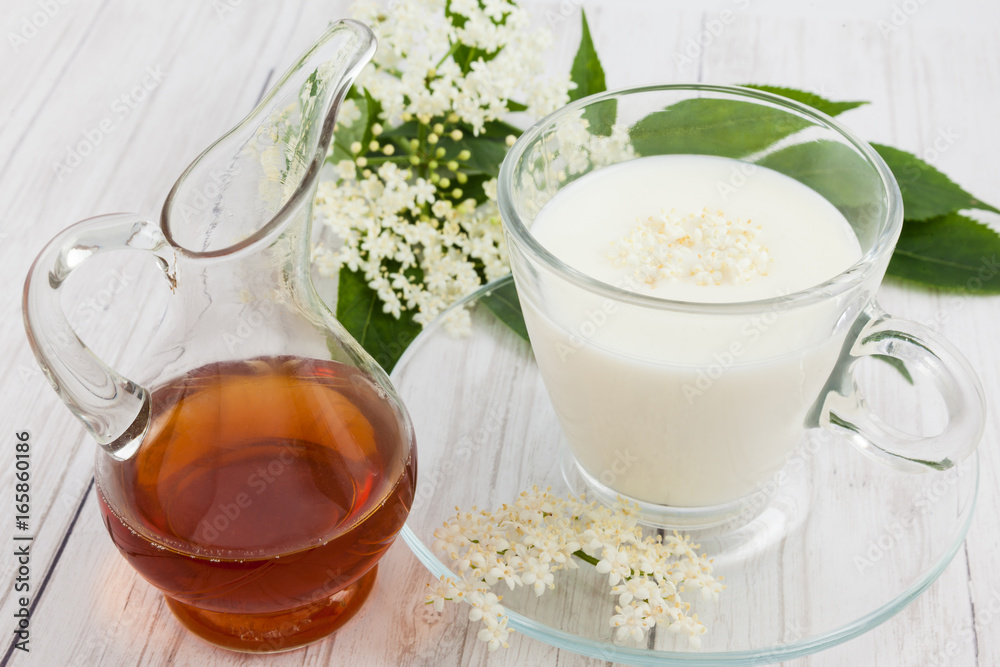 Elderflower (Sambucus nigra), milk and honey infusion for cough treatment Elderflower (Sambucus nigra), milk and honey infusion for cough treatment
