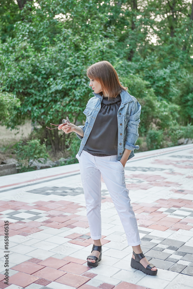 Beautiful young woman outdoors.