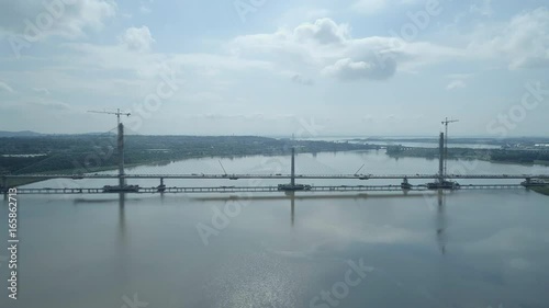 Aerial View of a Cable Stayed Bridge in the Late Construction Phase photo